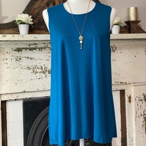 New arrival! Teal sleeveless back ruffle hem tunic